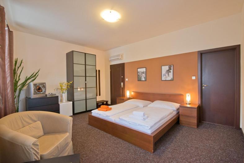Hotel U Zlateho Byka Písek Cameră foto