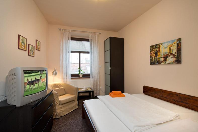 Hotel U Zlateho Byka Písek Cameră foto